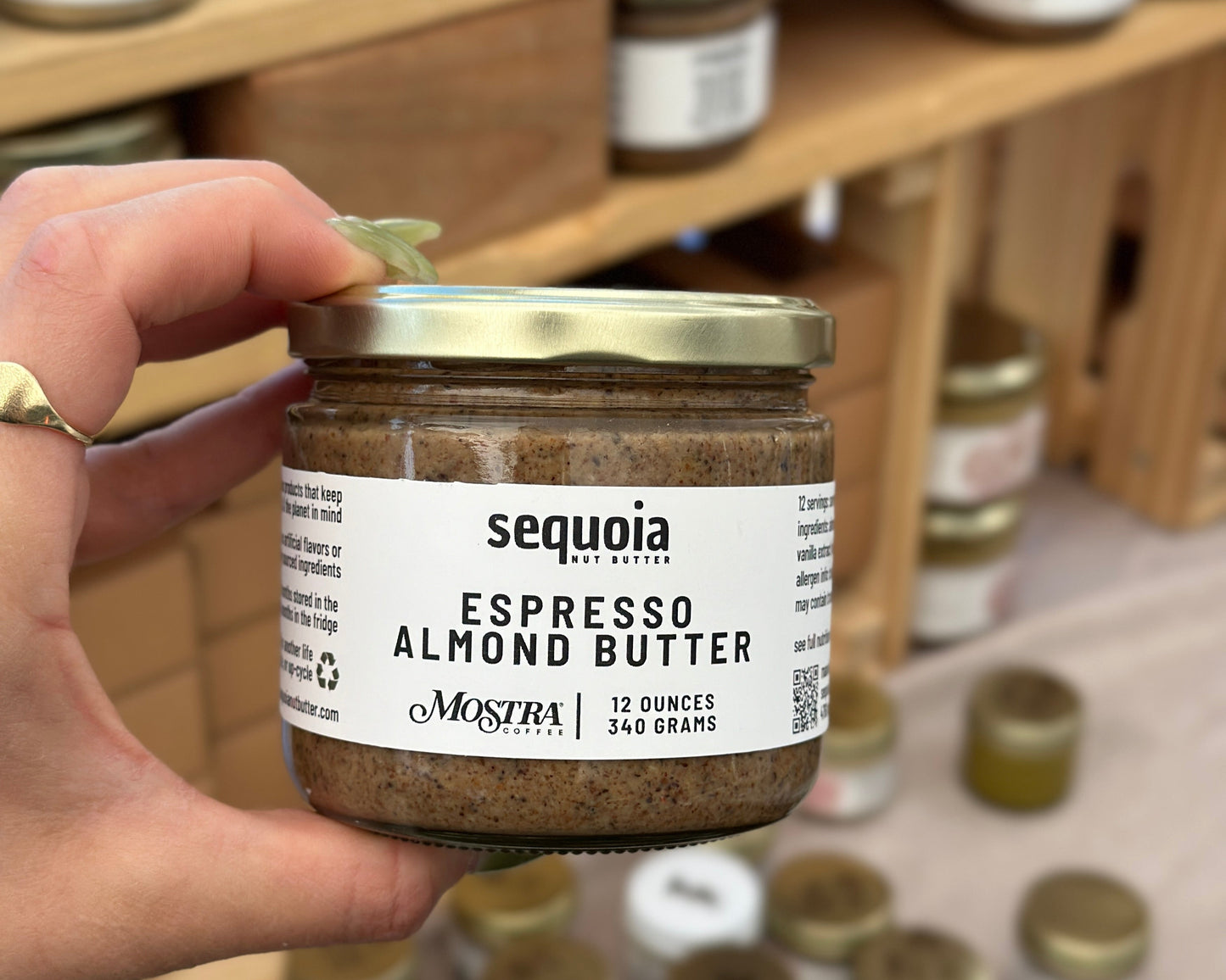Our espresso almond butter is crafted with premium California-grown almonds, organic maple sugar, and bold Mostra Coffee Ghost Bear espresso beans. Infused with pure vanilla and a touch of celtic sea salt, this creamy spread offers rich, nutty flavors with deep espresso notes and a hint of sweetness. Perfect for toast, smoothies, oatmeal, or straight from the jar. No added oils or refined sugars—just pure, energizing goodness. Order now from Sequoia Nut Butter!
